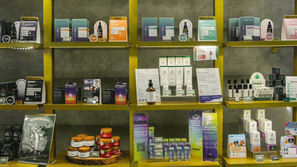 store shelf of siam green showing non-flower products, CBD products, wellness products 